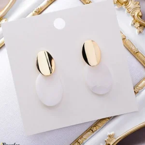 jätte Snygga örhängen i gyllene och vita färger<VSmycken Online