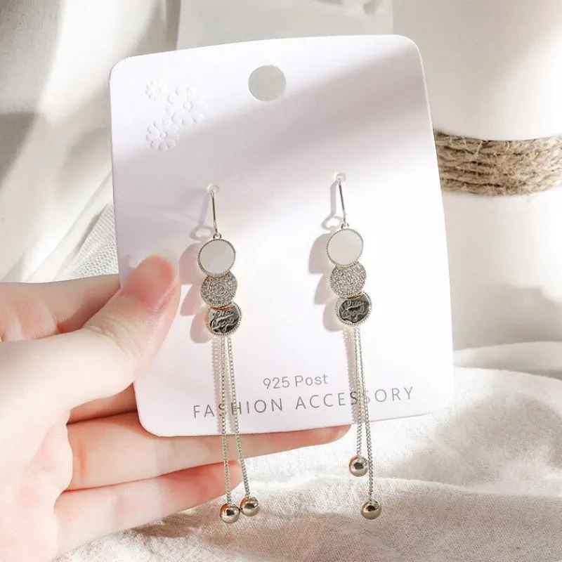 silvriga_three_disc_long__2.webp Silvriga Three Disc Long Tassel örhängen<VSmycken Online