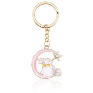 Vit kanin sitter på halvmåne stjärna och pärla nyckelring<VSmycken Clearance