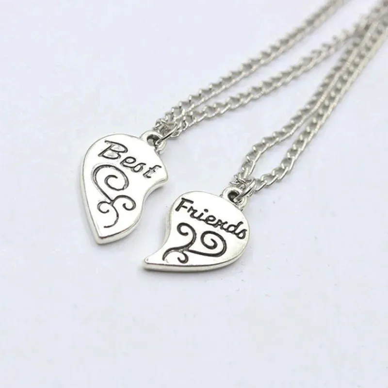 best_friends__halsband_me_1.webp Best Friends - Halsband med 2 kedjor - Delbart hjärta<VSmycken New