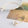 Guld marmor armband - white marble<VSmycken Outlet