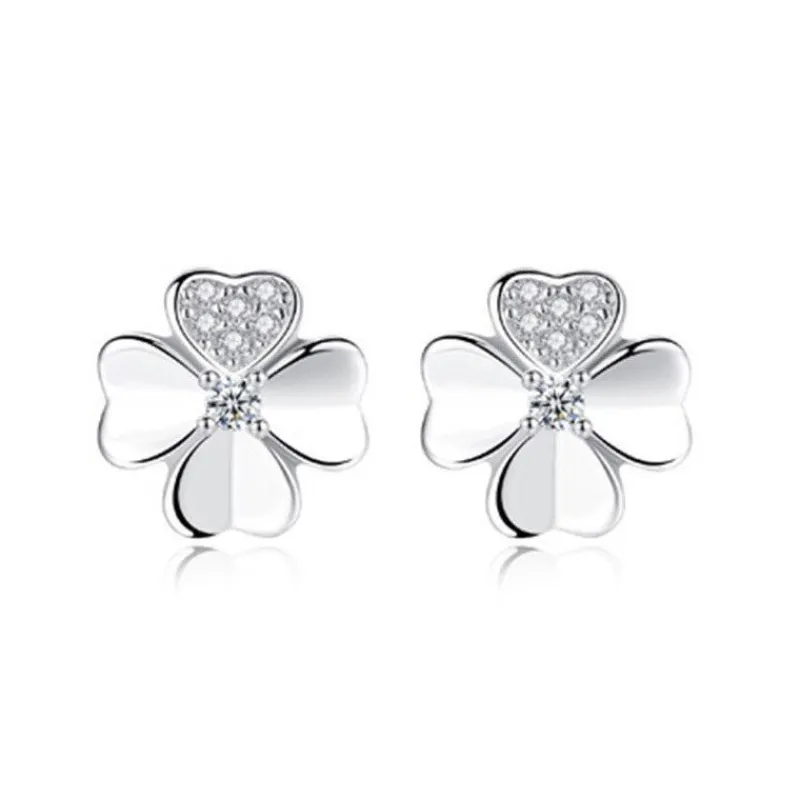 zirkon_clover_fyrklvrar_r_0.webp Zirkon Clover Fyrklövrar Örhängen i 925 sterling silver<VSmycken Online